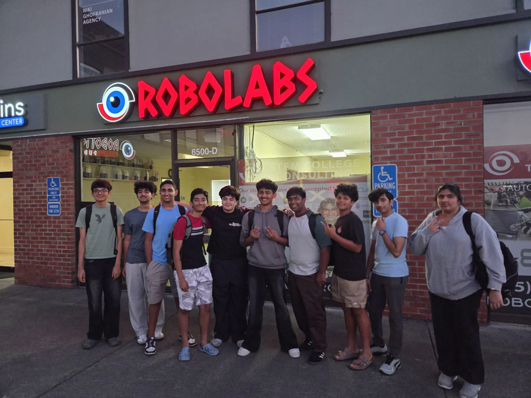 The 3134G GearShift team together outside the shop